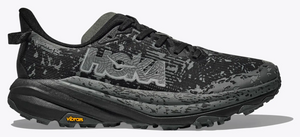Black and gray running shoe with visible branding on a white background