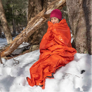 SOL Emergency Bivy with Rescue Whistle on Person - White Mountain Ski Co