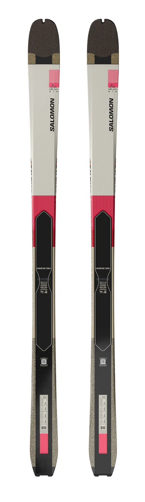 Two Salomon skis on a white background