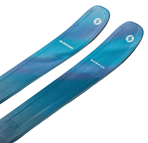Two blue skis with a gradient effect on a light gray background