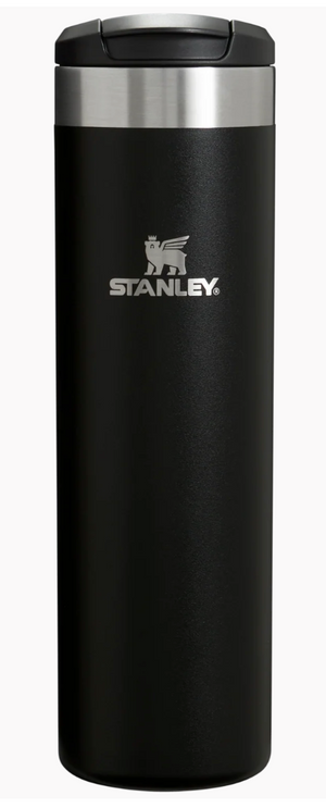 Black Stanley travel mug with silver lid on a white background