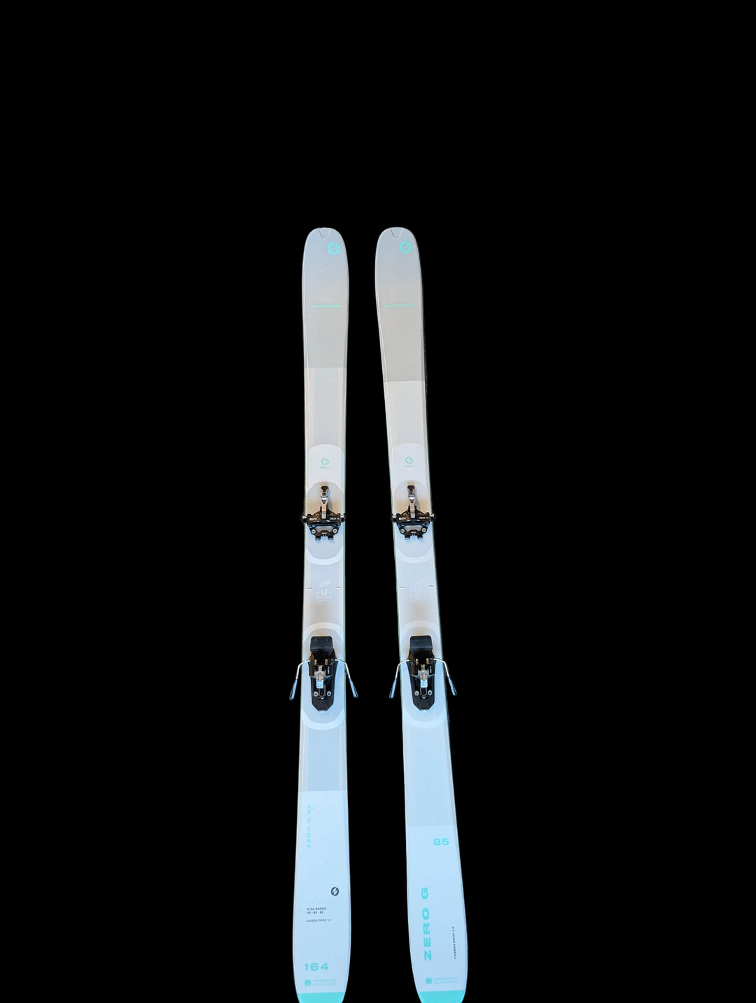 Two Blizzard white skis with bindings
