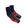 A pair of black and red ski boots resting on a cardboard box in an office or workshop setting. The box has a visible Vacuvm logo, and other office items are visible in the background.